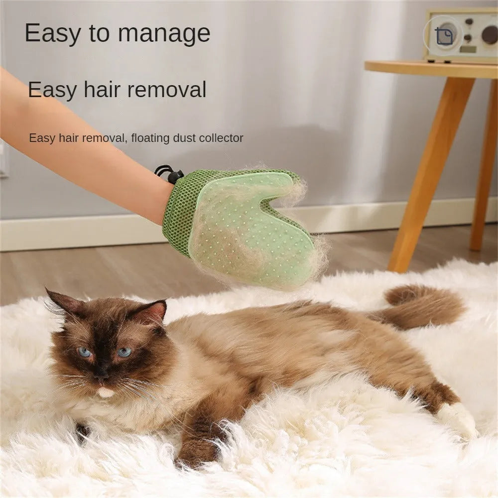 Dark blue mesh pet grooming glove for removing hair from dogs and cats