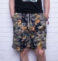 Men's linen beach shorts in cotton-linen blend with printed pattern, elastic waist, and drawstring.