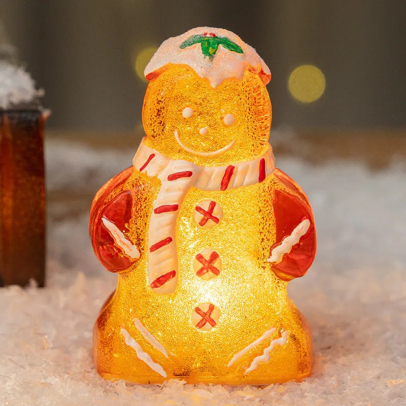 Glowing gingerbread man Christmas ornament with snowman design in plastic construction