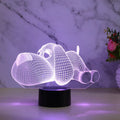 Doggo 3D illusion desktop lamp glowing in blue colour with touch button control.