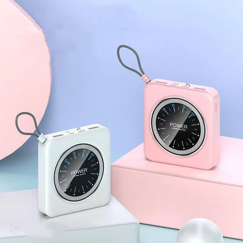 Compact alloy mini clock power bank charger in mint green with multiple USB output ports.
