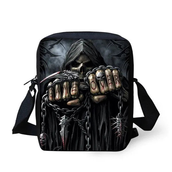 Medium-sized black children's messenger bag with a white skull pattern and double shoulder straps.