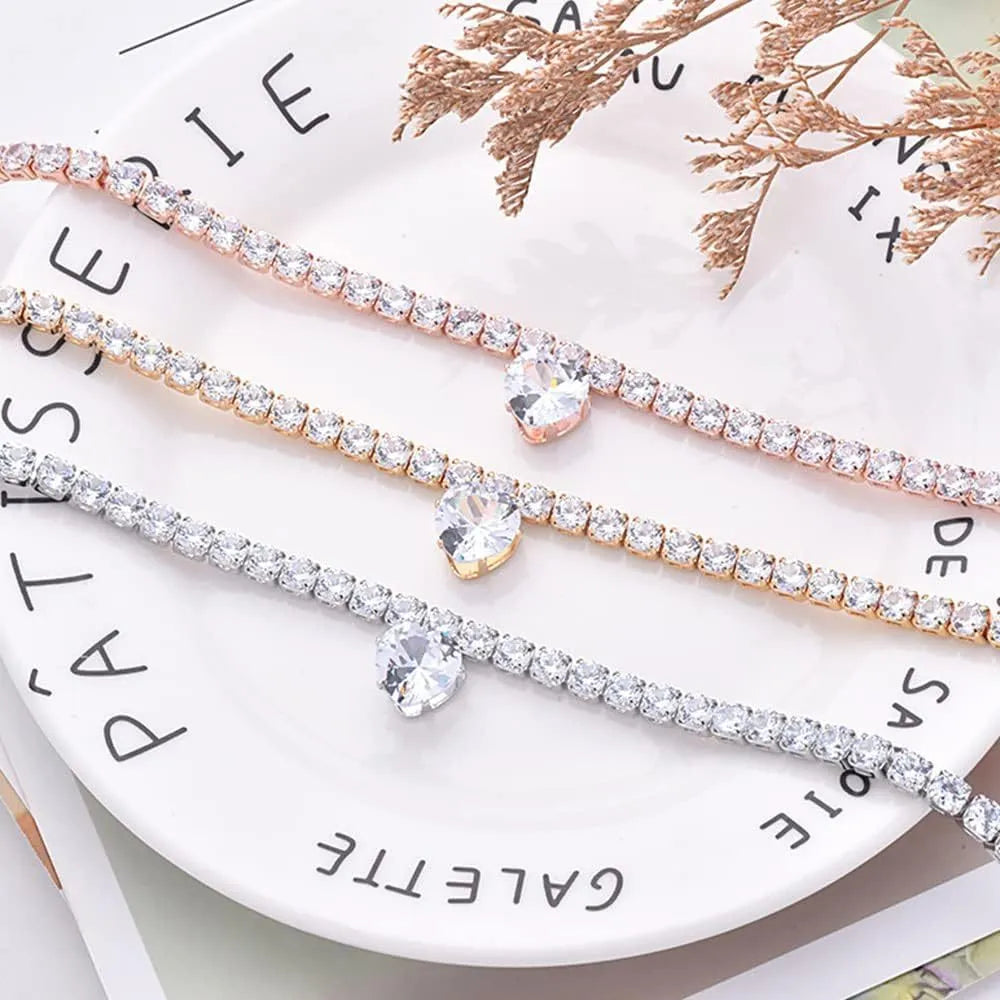 Gold rhinestone heart-shaped decorative collar for dogs or cats on a metal chain.