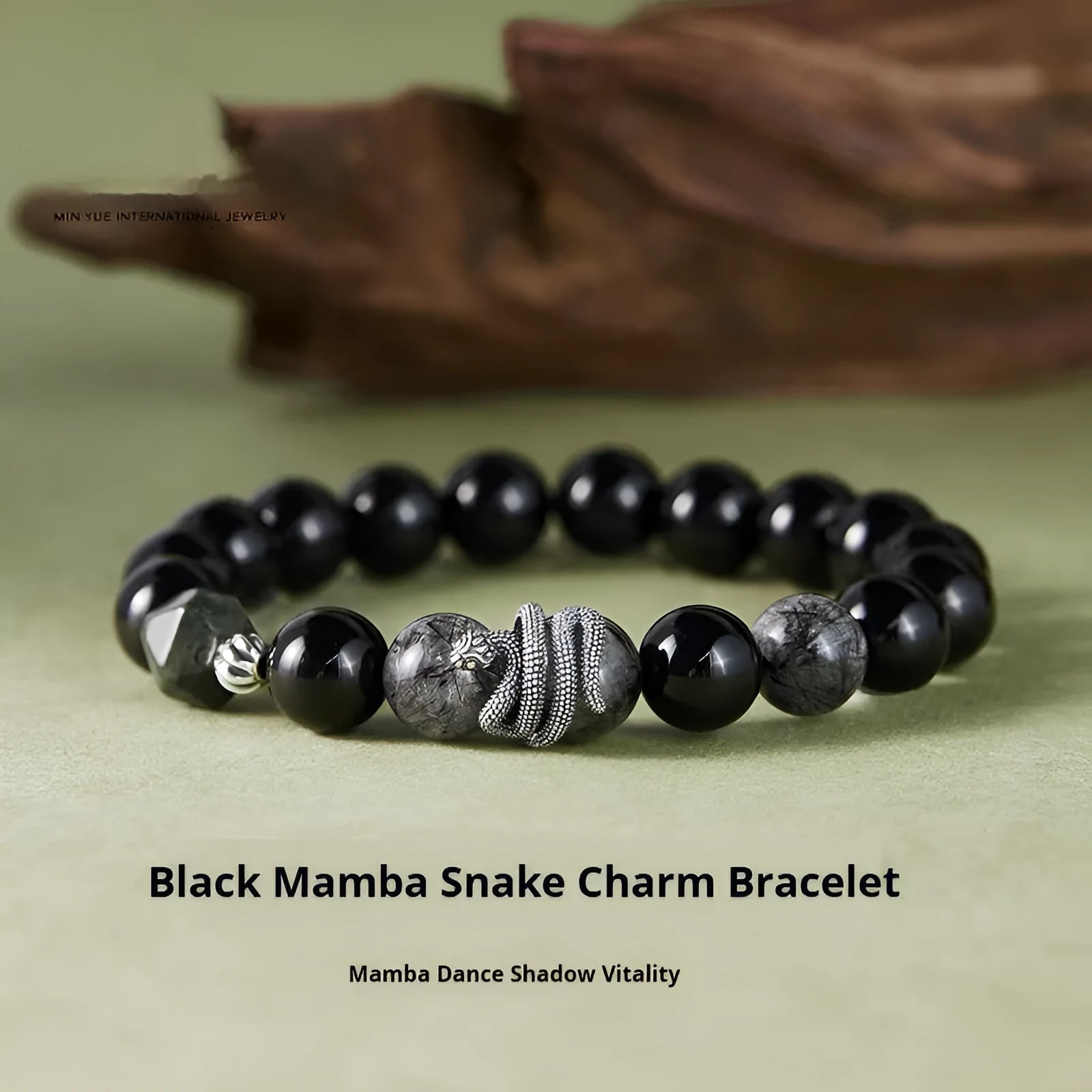 Men's black obsidian and sterling silver snake bracelet with retro Zodiac design
