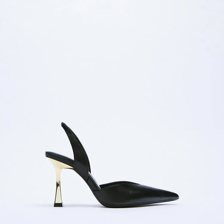 Women's pointed patent leather high heels in nude apricot colour with a shallow mouth design.