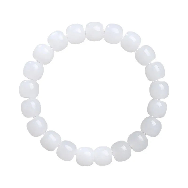 White jade barrel beads bracelet on wrist showing Hetian jade beads in casual unisex design