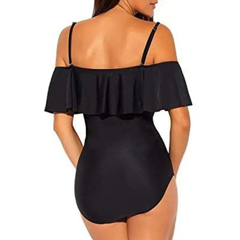 Black one-piece swimsuit with ruffled straps and side cut-out details