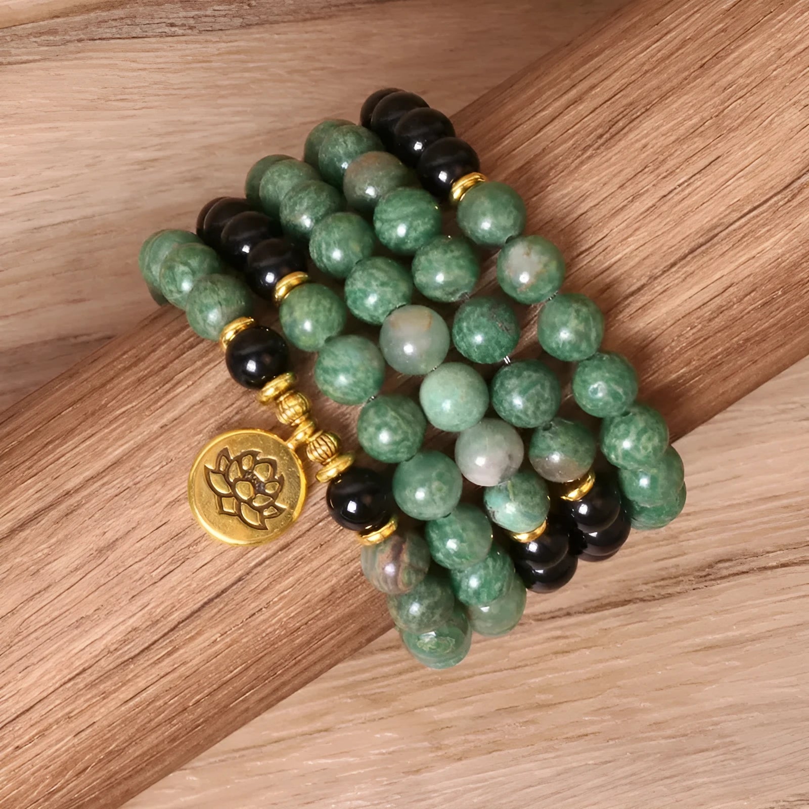 Green and black elastic beaded bracelet with alloy construction for women's wrist jewellery