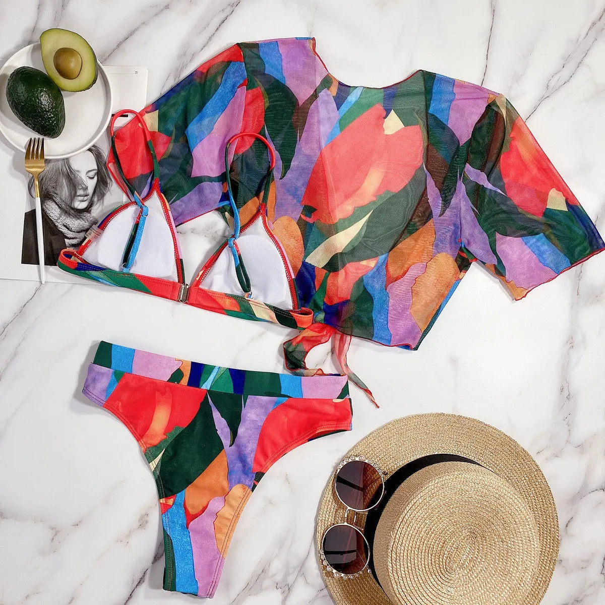 Red women's split swimsuit in nylon fabric for swimming and surfing.
