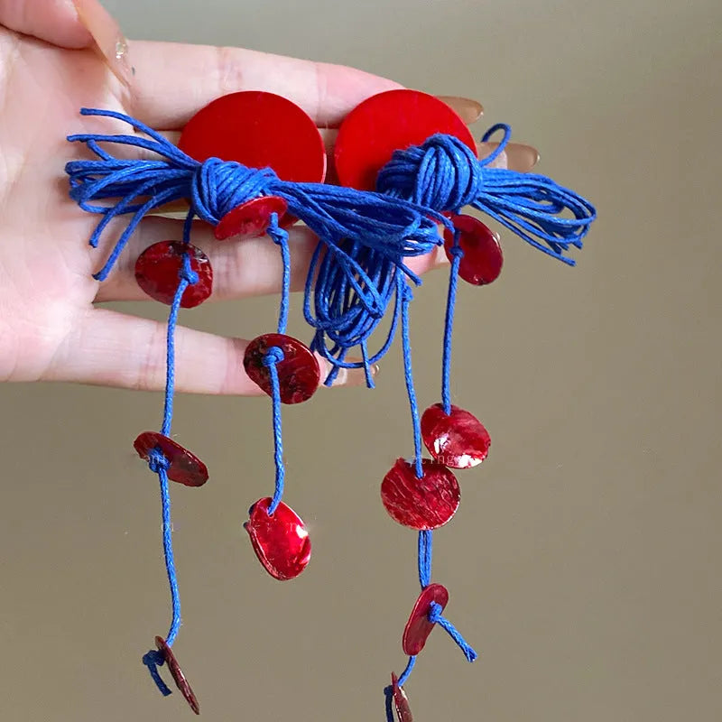 Geometric women's earrings with cloth construction and silver needle-blue resin flower accents