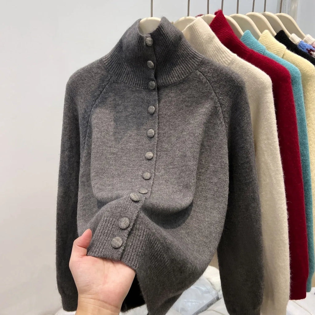 Women's loose fit turtleneck cardigan in thick polyester knit, button front, available in six colours including red and blue