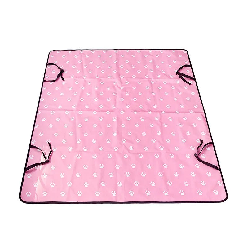 Car pet mat covering rear seat with water resistant cloth material in choice of colours and paw print designs