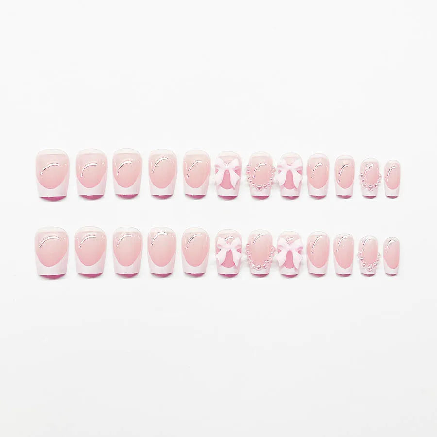 Nail art set with S274 glue showing French designs, bows, and leopard patterns for short square nails
