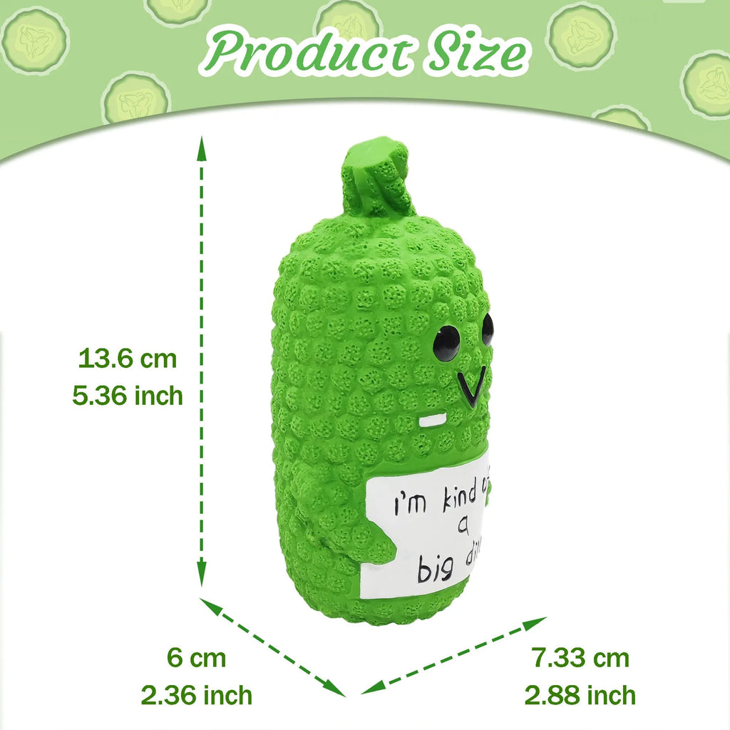Green pickle-shaped squeaky dog toy with textured surface for dental cleaning during chewing