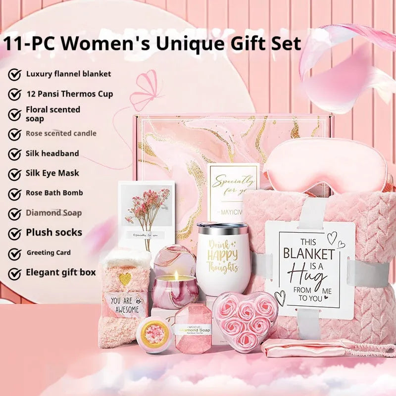 Aromatherapy gift set box containing scented candles, soaps, and bath accessories.