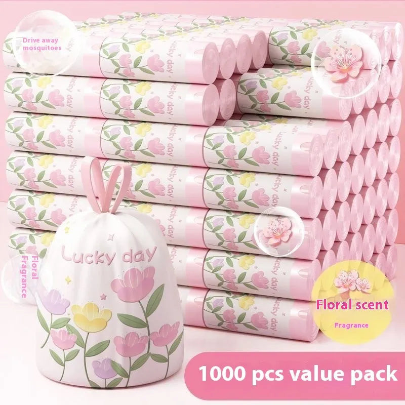 Pink degradable argy wormwood mosquito repellent garbage bag with drawstring, size 44cm by 48cm.