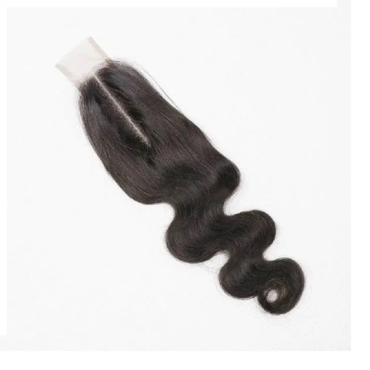 Straight human hair wig in natural colour on a mannequin head, showing hand-woven cap construction.