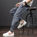 Men's loose cargo casual jeans in straight leg cut with micro elastic cotton fabric
