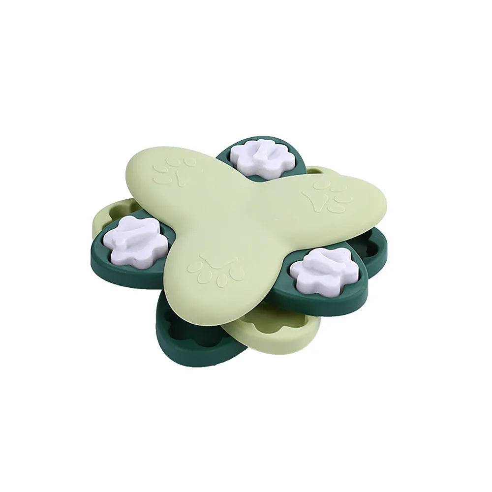 Green dog puzzle toy with bone-shaped lids and non-slip base for treat dispensing