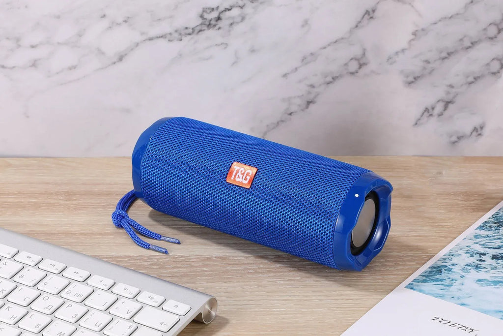Fabric-covered portable Bluetooth speaker with card holder slots in multiple colour options