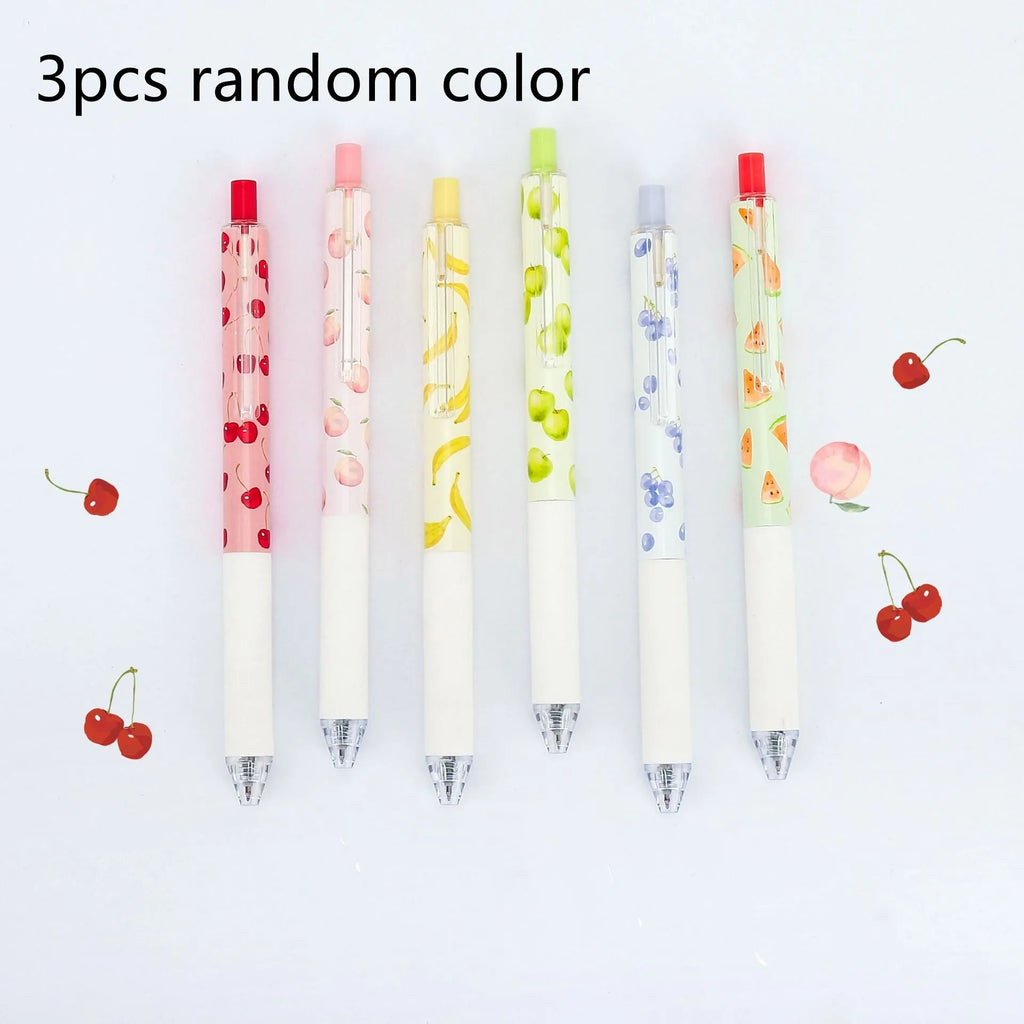 Three scented fruit pens with 0.5mm black ink and press mechanism on white background