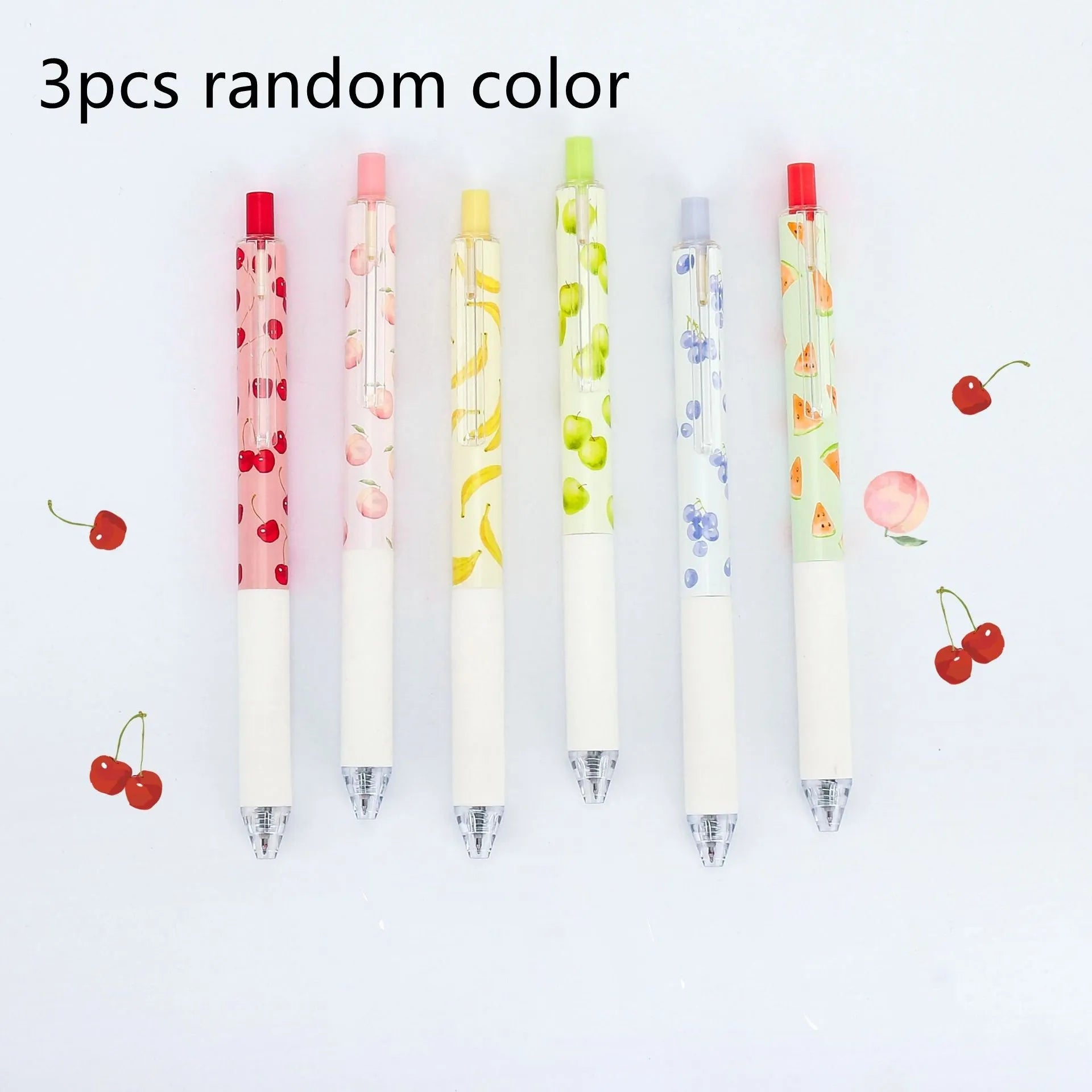 Three scented fruit pens with 0.5mm black ink and press mechanism on white background