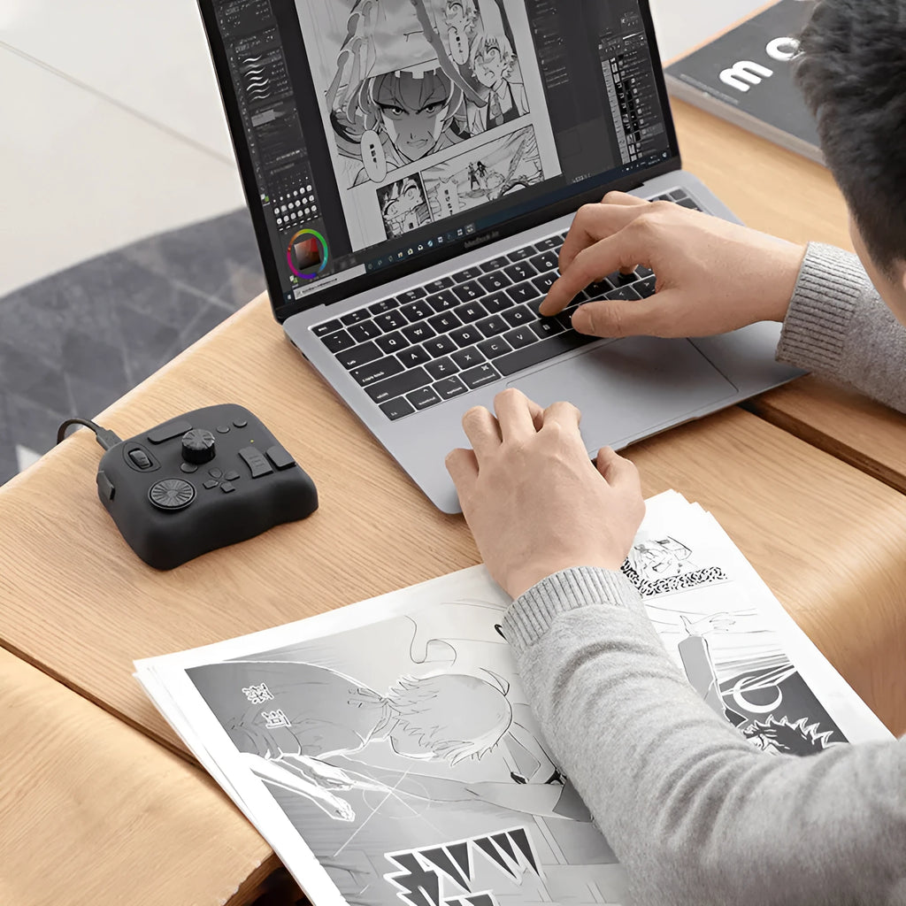 TourBox NEO custom auxiliary keyboard for video editing, showing black finish and compact tablet design.