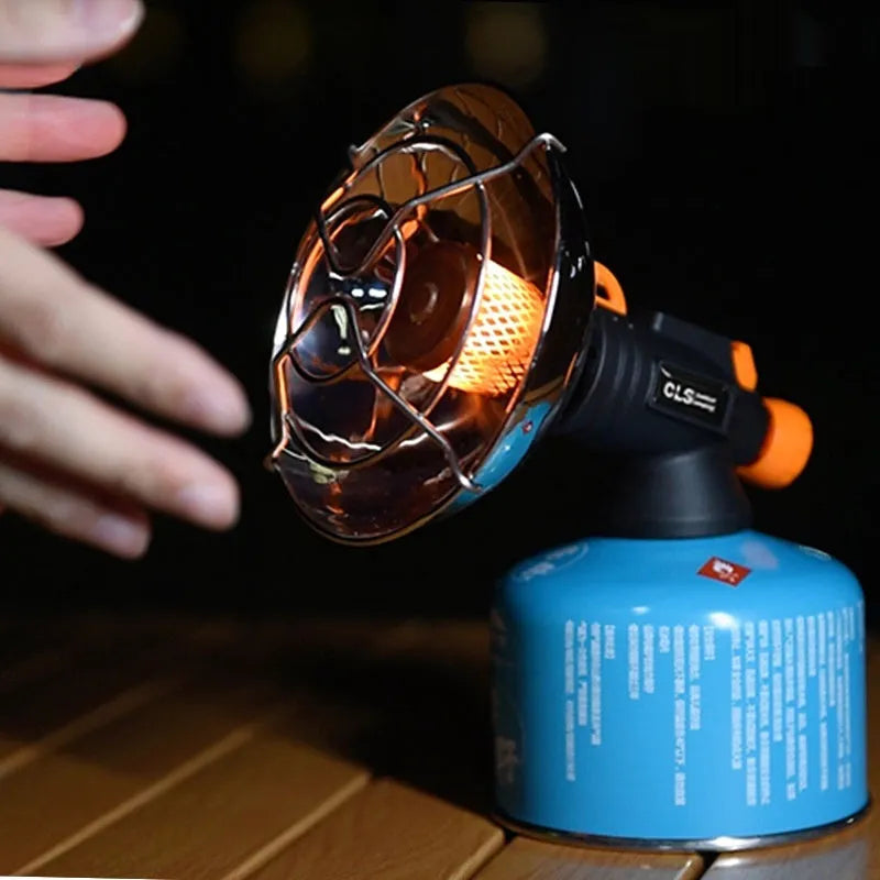 Black and orange portable heating stove for outdoor camping with automatic ignition