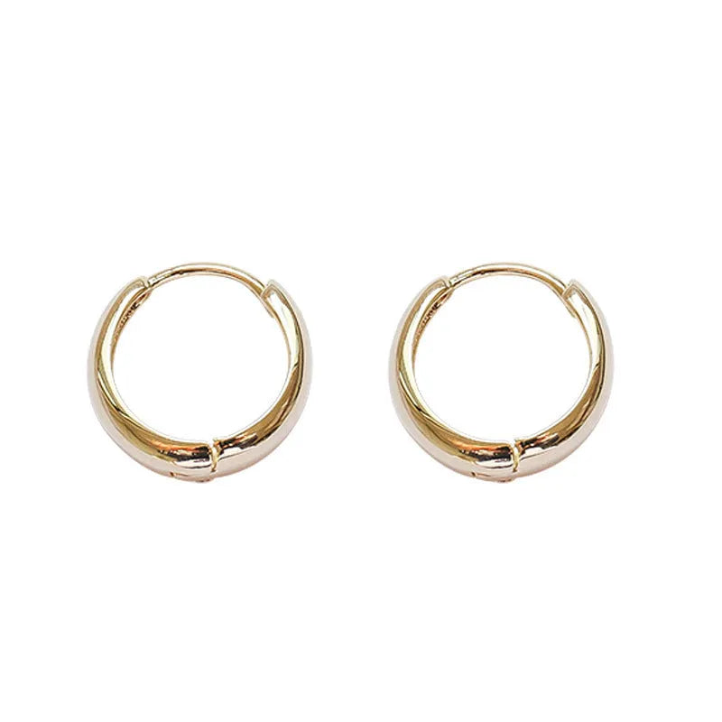 Women's geometric water drop earrings in gold or silver finish, shown in large, medium, and small sizes.