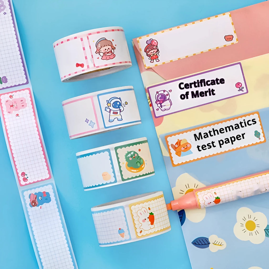 Roll of cartoon name tape stickers showing dinosaur, astronaut, rabbit, and girl designs.