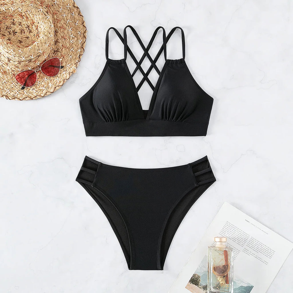 Women's v-neck halter bikini swimsuit in nylon fabric on a model.
