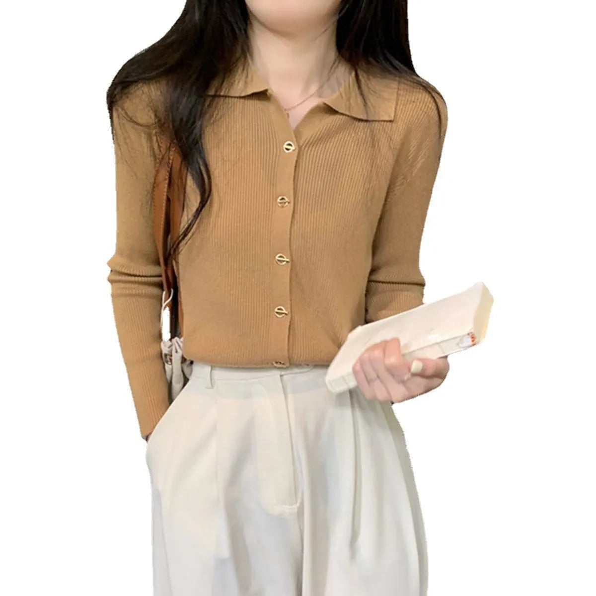 Loose-fitting knitted cardigan in viscose fibre showing long sleeves and neutral colour options