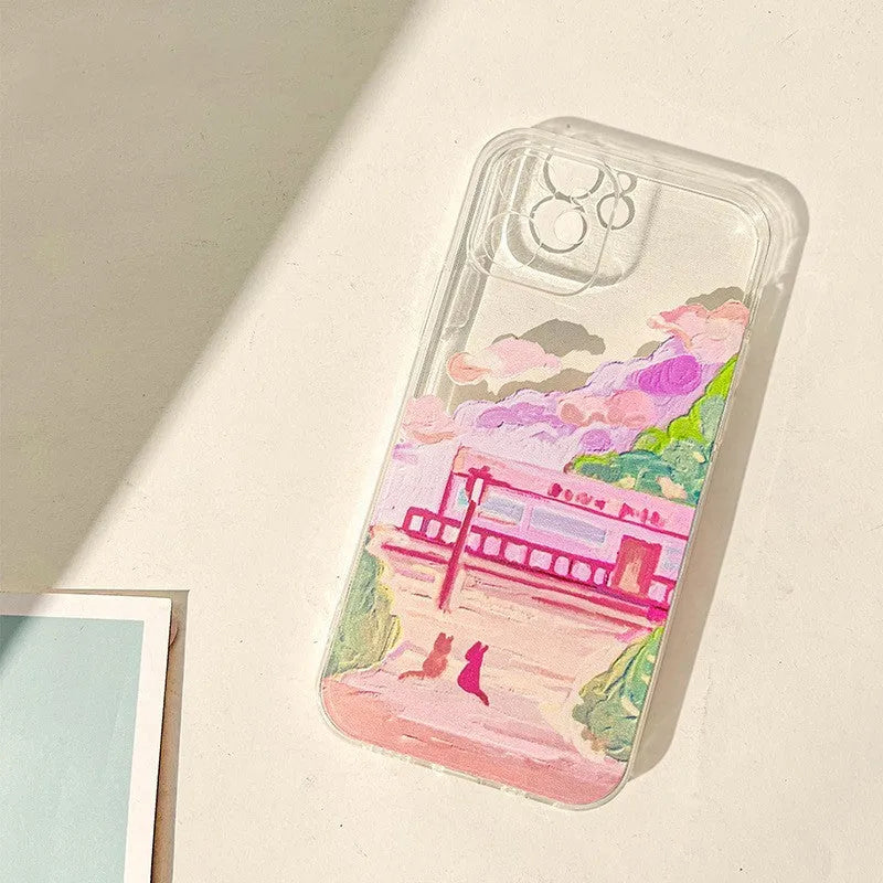 Soft silicone iPhone case with a colourful cartoon graphic of two cats on the back.
