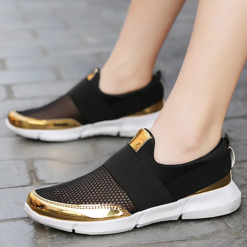 Blue, black, and grey low-top women's sneakers with breathable mesh lining and lightweight PU midsole.