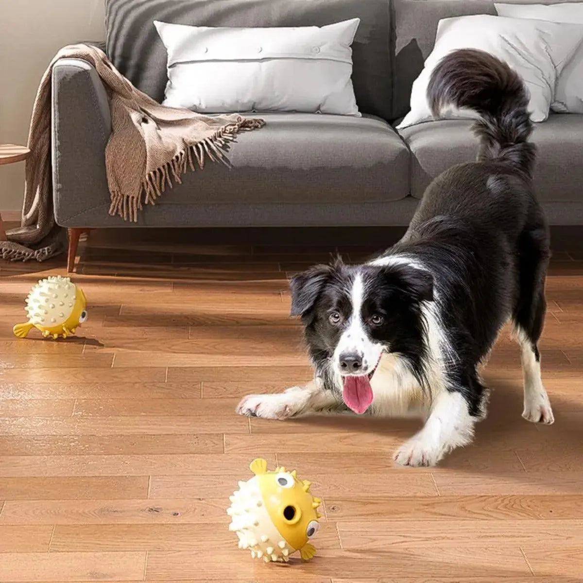 Yellow fish-shaped durable vinyl dog chew toy with textured surface for teeth cleaning.