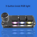 Black custom keypad with RGB backlight and copy paste buttons on desktop
