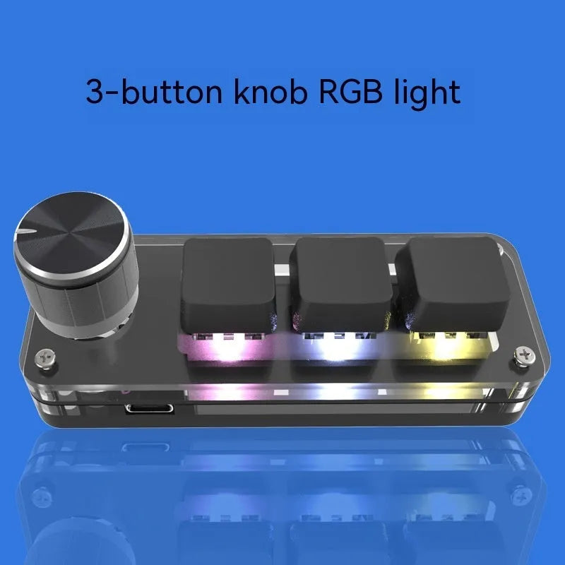 Black custom keypad with RGB backlight and copy paste buttons on desktop