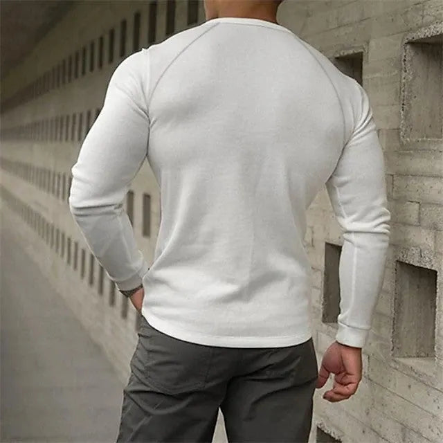 Men's white Henry collar long-sleeved cotton blend t-shirt laid flat.