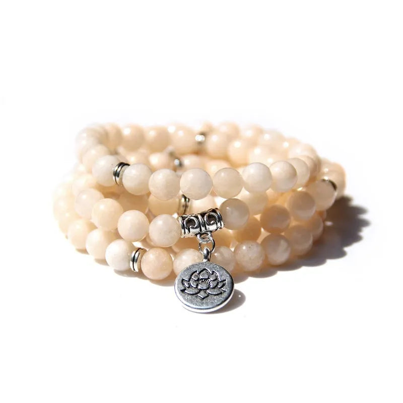 Women's natural stone bracelet with lotus elements and geometric design