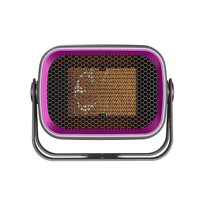Compact grey desktop ceramic heater with rotatable grill on a wooden desk.