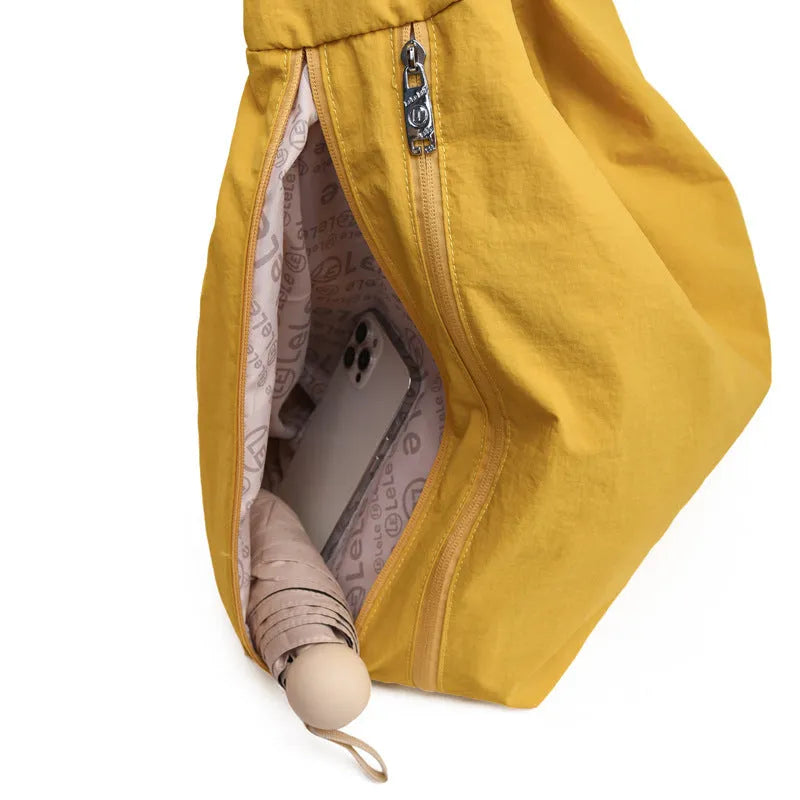 Women's heart-shaped nylon underarm bag in black, yellow, khaki and blue colours with large capacity