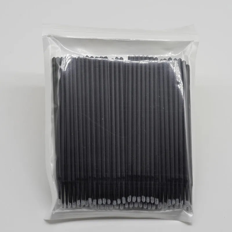 Disposable micro applicator brushes with colourful handles and bendable cotton swabs for makeup and eyelash extensions