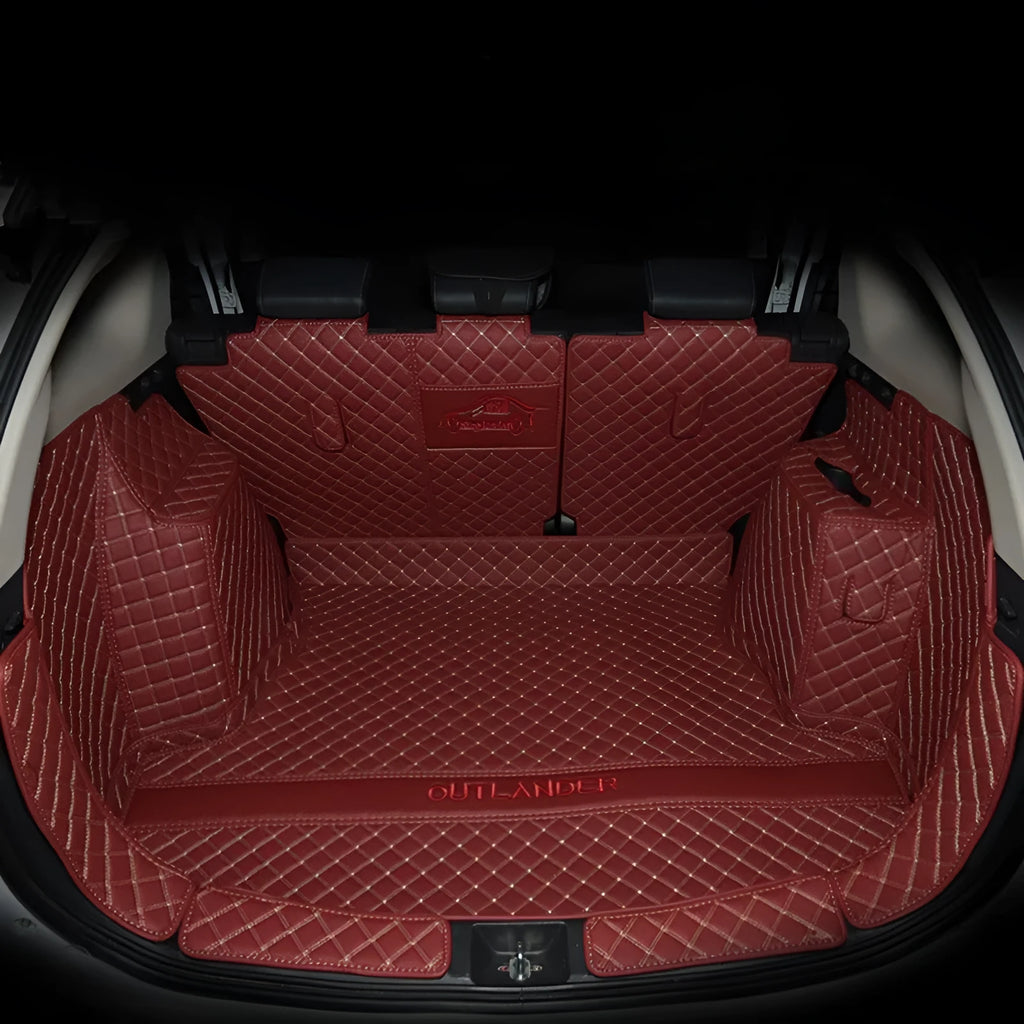 Custom-fitted TPE XPE boot liner with 3D edging for a Mitsubishi Outlander.