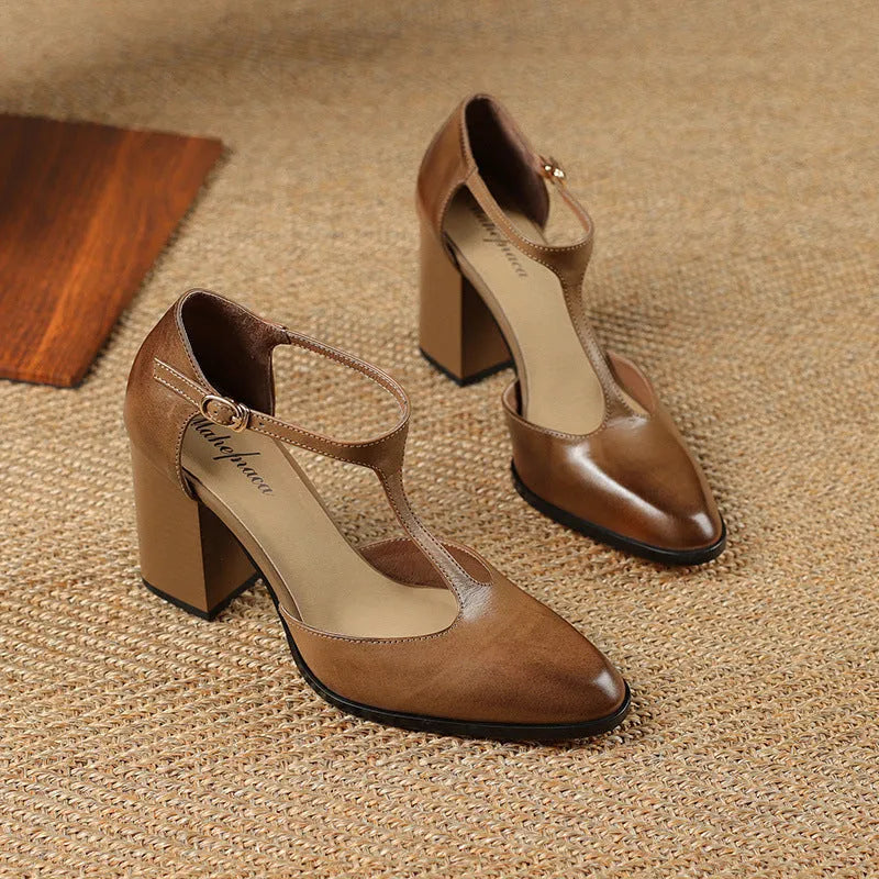 Women's dark brown retro Mary Jane shoes with pointed toe, buckle fastening and hollow design