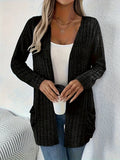 Loose fit long sleeve cardigan in solid black or granny grey colour shown on model