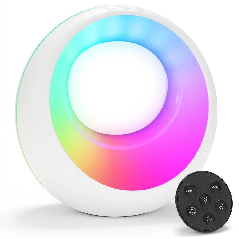Creative Touch small white RGB colour-changing desk lamp with remote control on a wooden table.