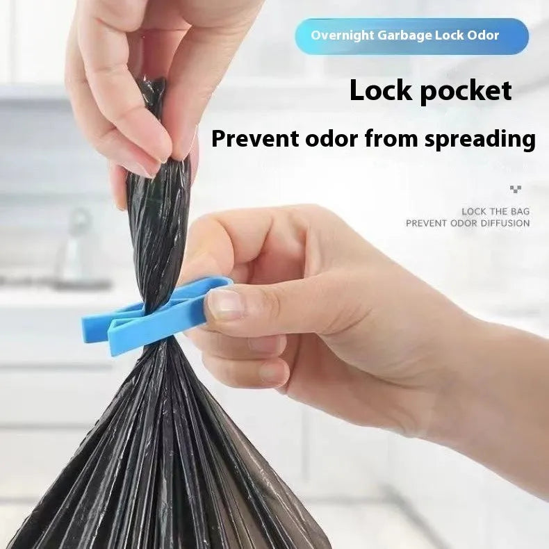 Grey PP plastic garbage bag fixing clip attached to bin side holding liner securely