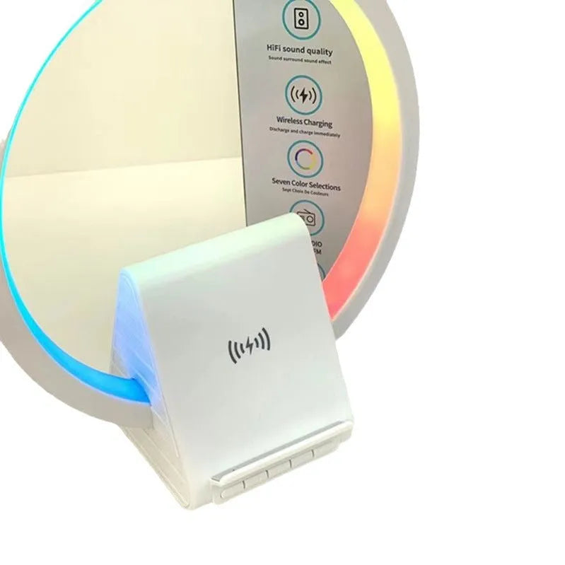 White circular smart Bluetooth speaker with ambient lighting and wireless charging pad