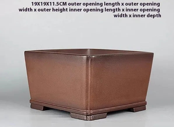 Brown handmade purple clay antique flower pot with classical design and single drainage hole