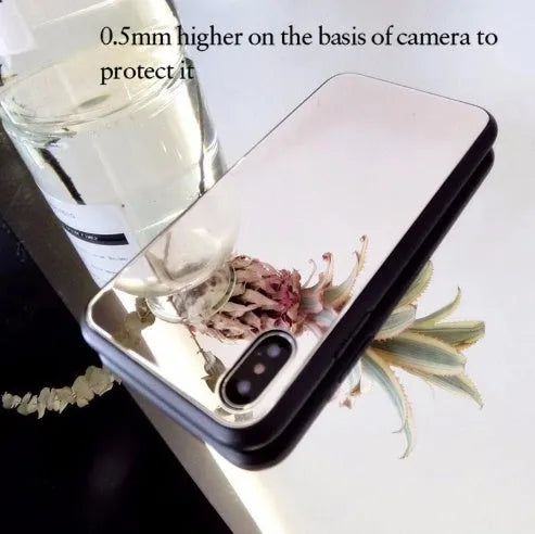 Black clear glass iPhone mirror phone case showing reflective surface and iPhone compatibility